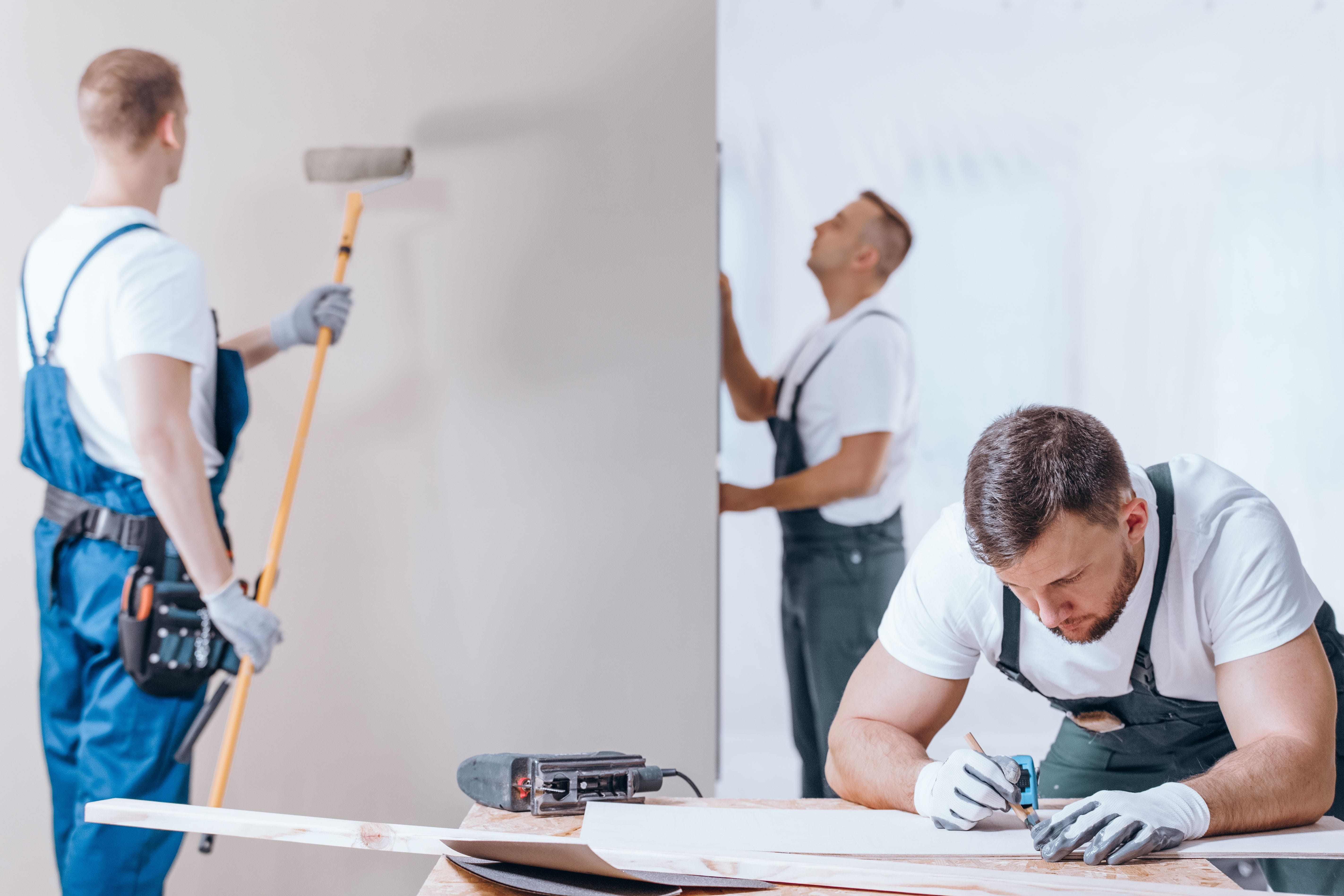 Men Renovating a Room